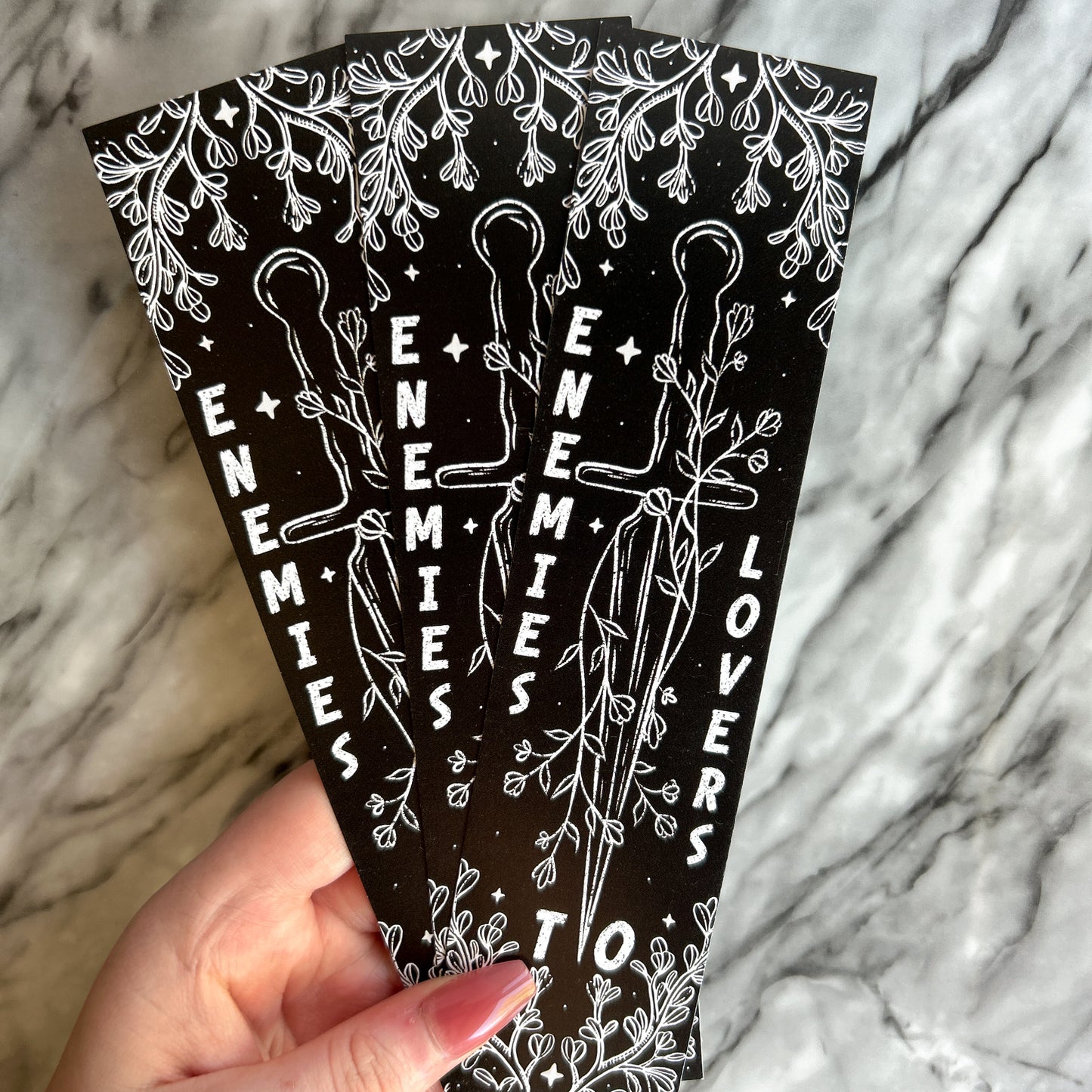 Enemies to lovers bookmark